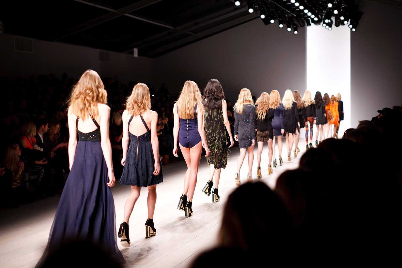 Fashion Week models walking on a runway